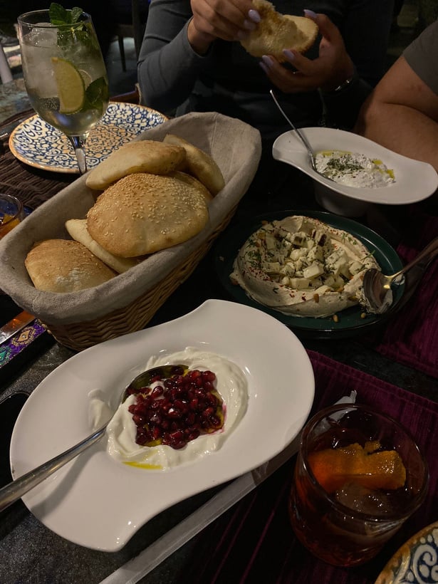 Some Arabic dips and bread with pomegrante in Dubai